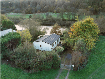Two bedroom riverside chalet built on stilts to prevent the risk of flooding